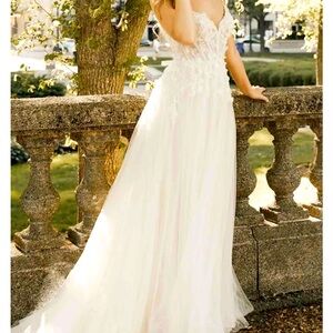 Wedding Dress Designer & Style: All Who Wander, Luca. Bohemian wedding gown.